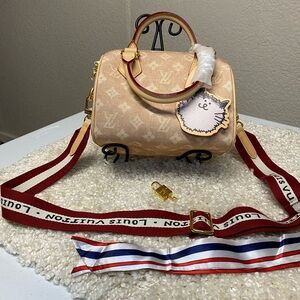 Louis Vuitton Beige Monogram Speedy Bandoulière with Red Strap